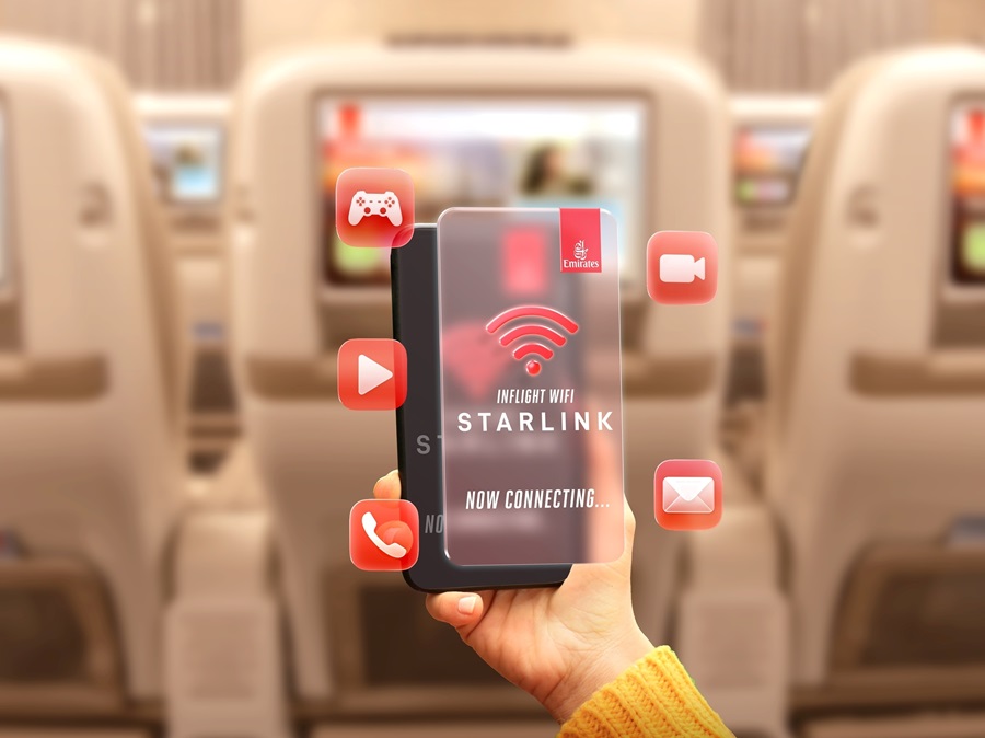 Hand holding a device showing inflight WiFi Starlink with floating app icons (games, video, call, email) in an airplane cabin