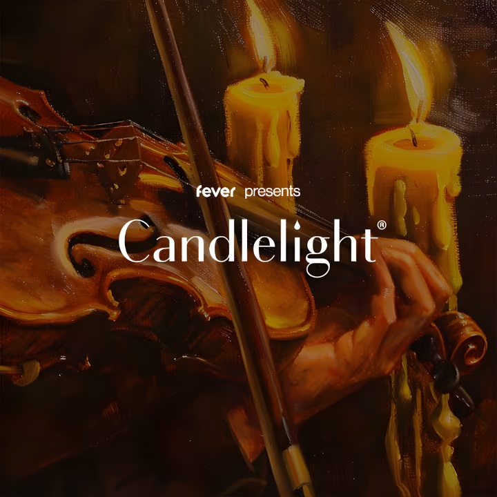 Promotional image for Candlelight by Fever Presents, featuring a violin being played beside warm candlelight.
